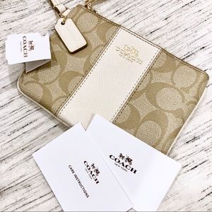 NWT Coach Cream and Gold Wristlet